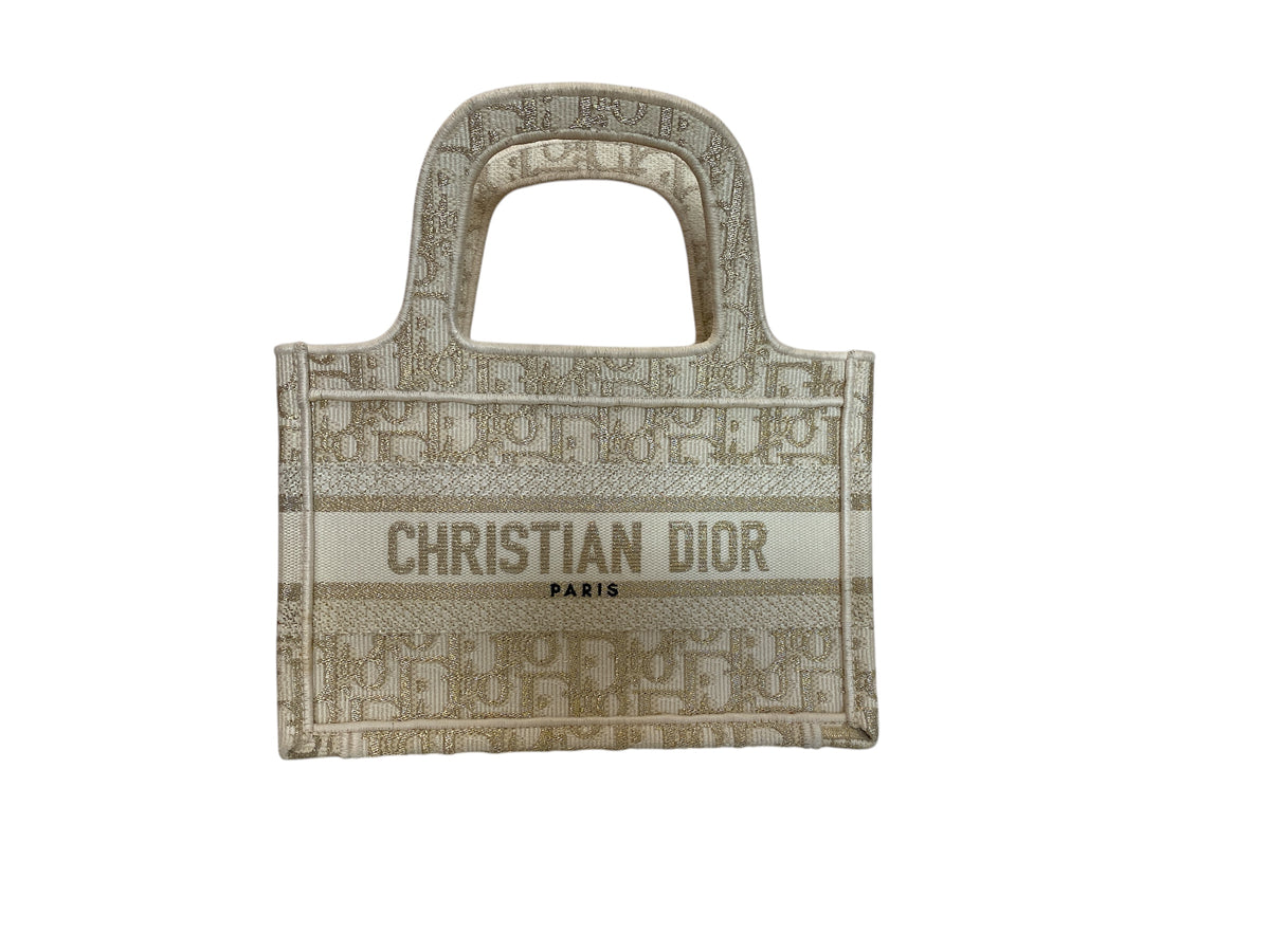 Bolso de mano Christian Dior Book Tote Mini de lona bordada en blanco roto y dorado